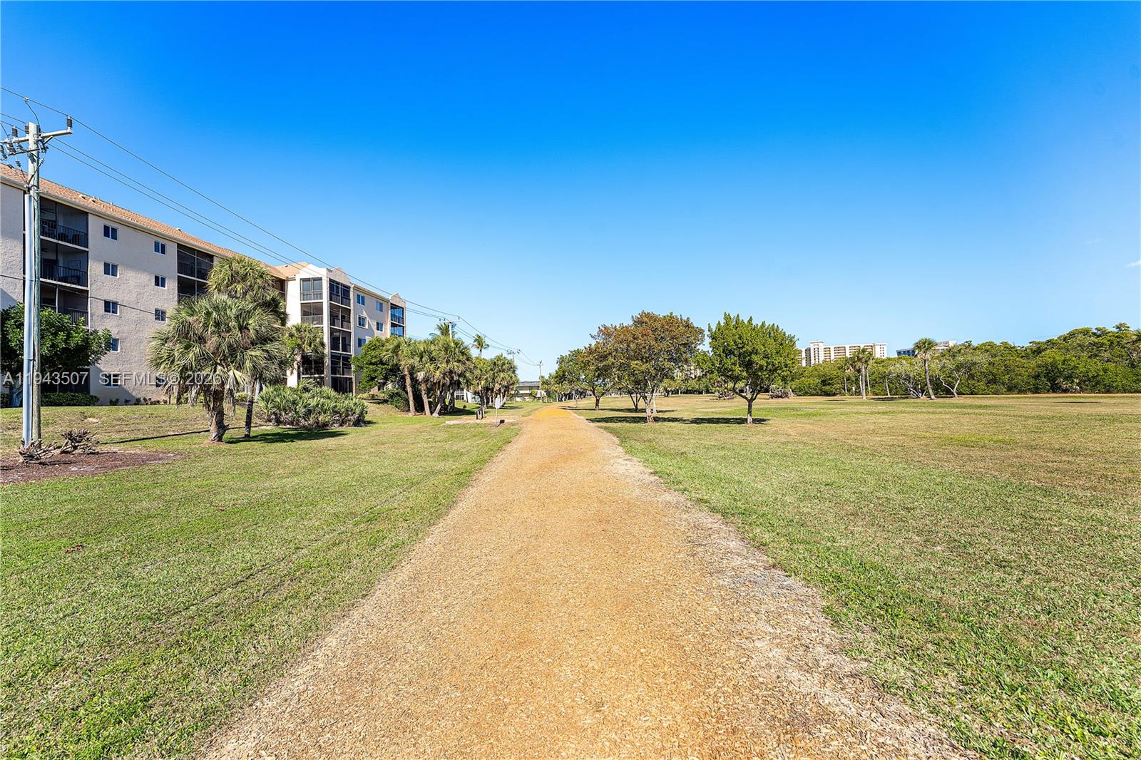 275 Palm Avenue, Unit B207 Jupiter, FL 33477 - Photo 27 of 29 a view of lake with residential house