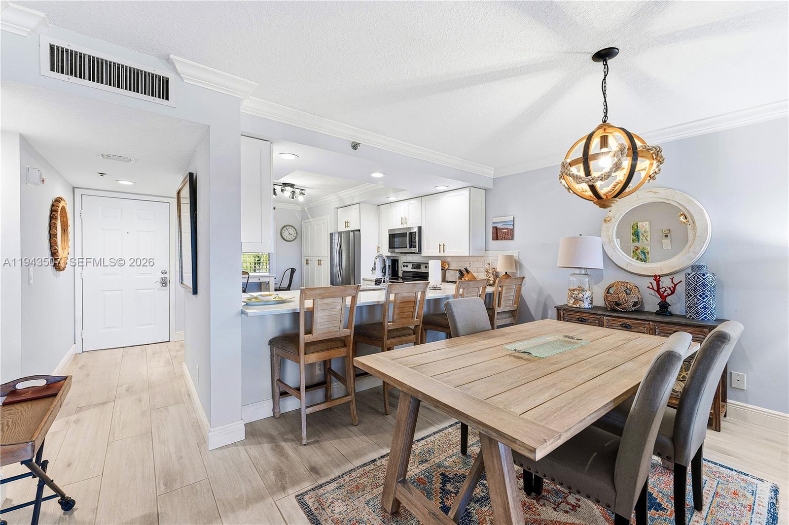 275 Palm Avenue, Unit B207 Jupiter, FL 33477 - Photo 7 of 29 a view of a dining room and livingroom view