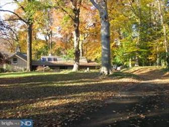 520 Huston Road St. Davids, PA 19087 - Photo 2 of 4 a backyard of a house with lots of green space