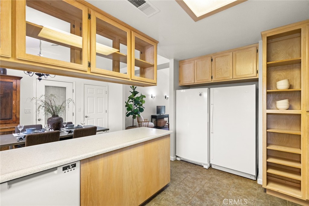 38 Lacewing Court Chico, CA 95973 - Photo 12 of 46 a kitchen with a refrigerator and a sink