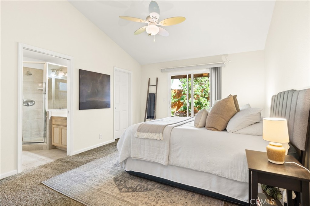 38 Lacewing Court Chico, CA 95973 - Photo 16 of 46 a bedroom with a large bed and a window