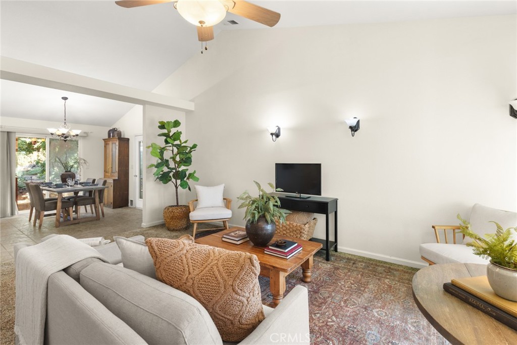 38 Lacewing Court Chico, CA 95973 - Photo 7 of 46 a living room with furniture and a flat screen tv