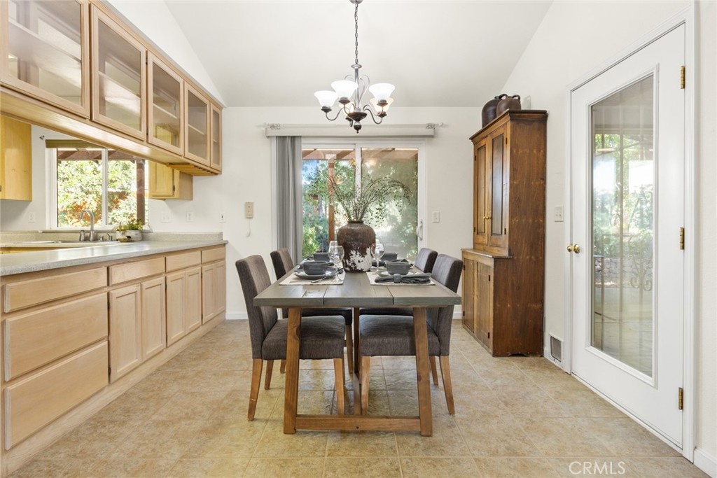 38 Lacewing Court Chico, CA 95973 - Photo 8 of 46 a view of a dining room with furniture window and outside view
