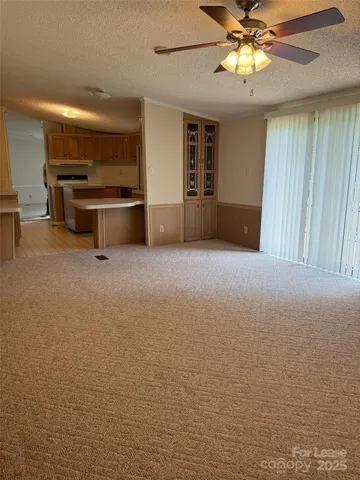 a view of a livingroom with a furniture
