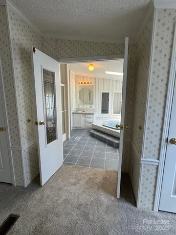 a view of an entryway with a livingroom