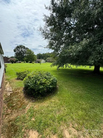 a view of a lake with a big yard