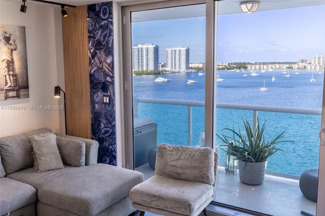 a living room with furniture flowerpot and a potted plant