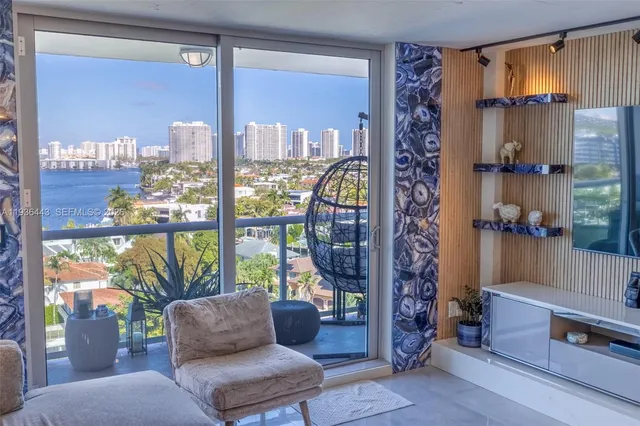 a view of living room filled with furniture
