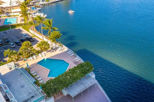 a room with furniture a rug and a window