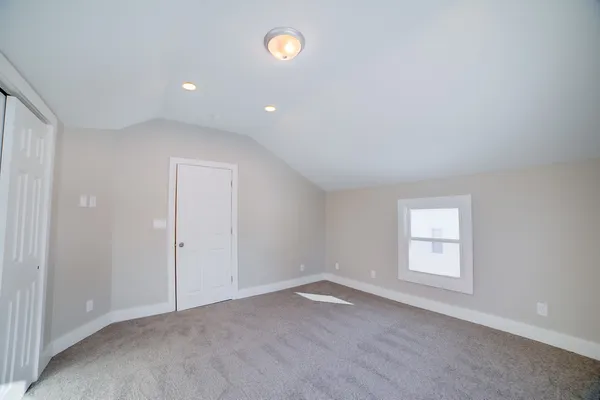 a view of an empty room and window