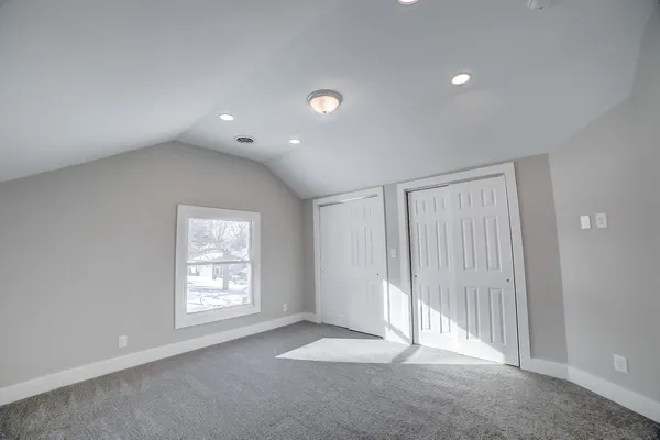 an empty room with windows