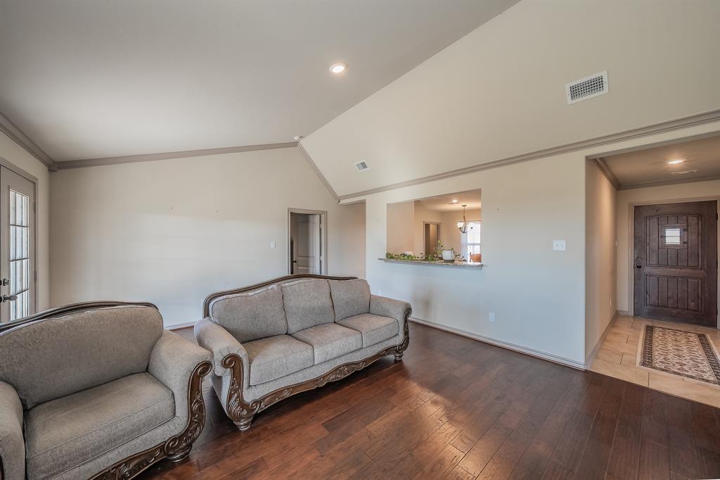 2376 Farm To Market Road 2264 Decatur, TX 76234 - Photo 12 of 39 a living room with furniture and a wooden floor