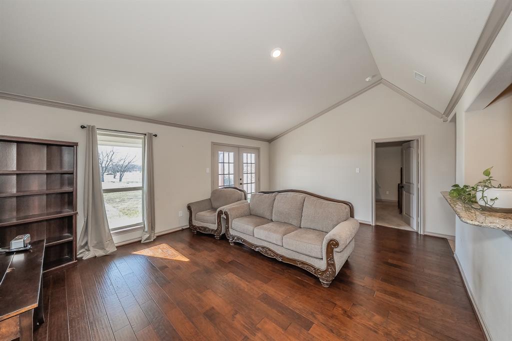 2376 Farm To Market Road 2264 Decatur, TX 76234 - Photo 13 of 39 a living room with furniture and a wooden floor