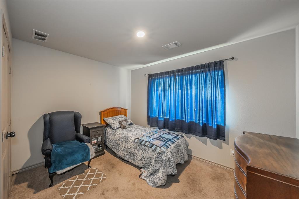 2376 Farm To Market Road 2264 Decatur, TX 76234 - Photo 16 of 39 a bedroom with furniture and a window