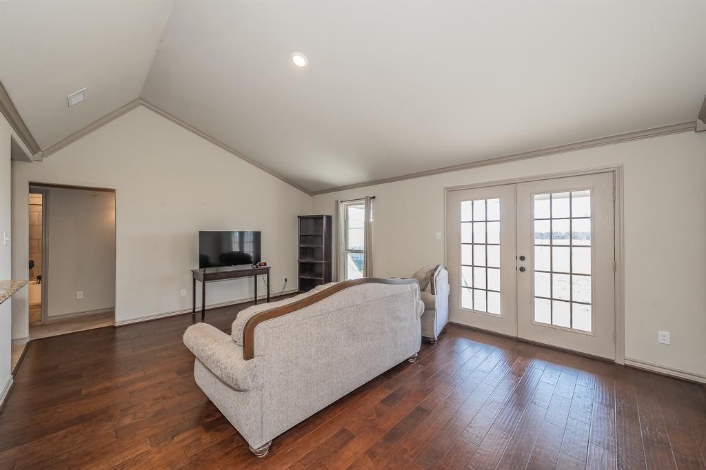 2376 Farm To Market Road 2264 Decatur, TX 76234 - Photo 20 of 39 a living room with furniture and a flat screen tv