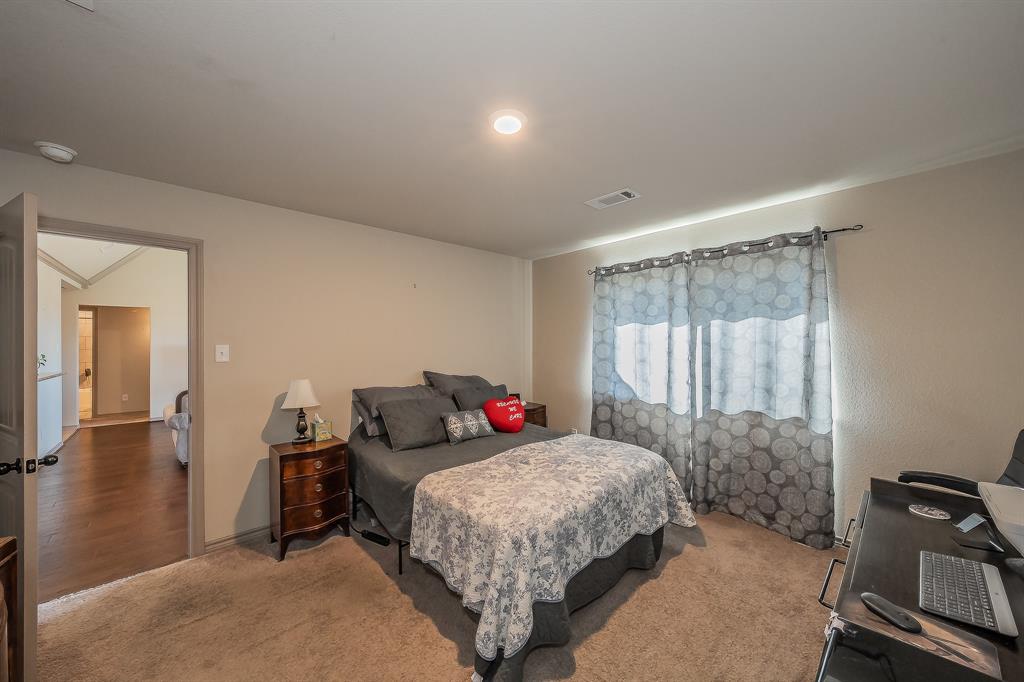 2376 Farm To Market Road 2264 Decatur, TX 76234 - Photo 29 of 39 a bedroom with a bed and a window