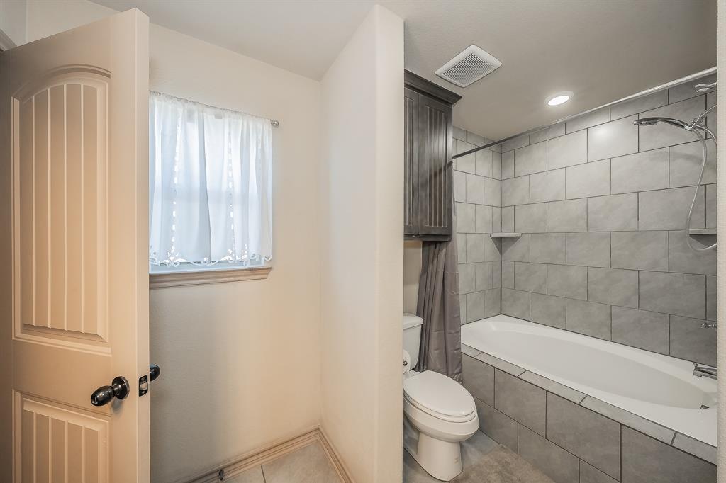 2376 Farm To Market Road 2264 Decatur, TX 76234 - Photo 30 of 39 a bathroom with a toilet and a shower