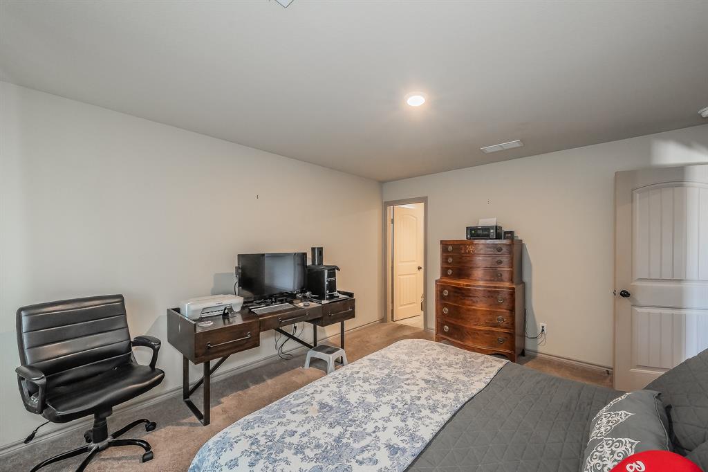 2376 Farm To Market Road 2264 Decatur, TX 76234 - Photo 31 of 39 a living room with furniture and a flat screen tv