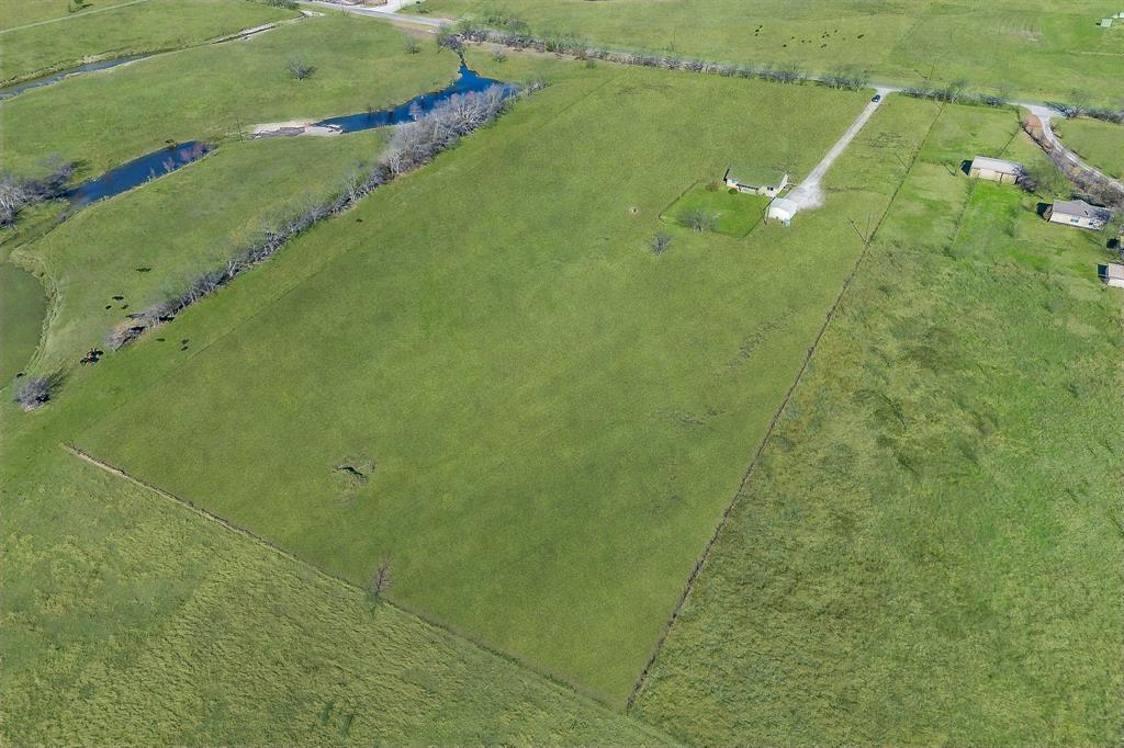 2376 Farm To Market Road 2264 Decatur, TX 76234 - Photo 35 of 39 a view of a bathroom with a sink and bath tub