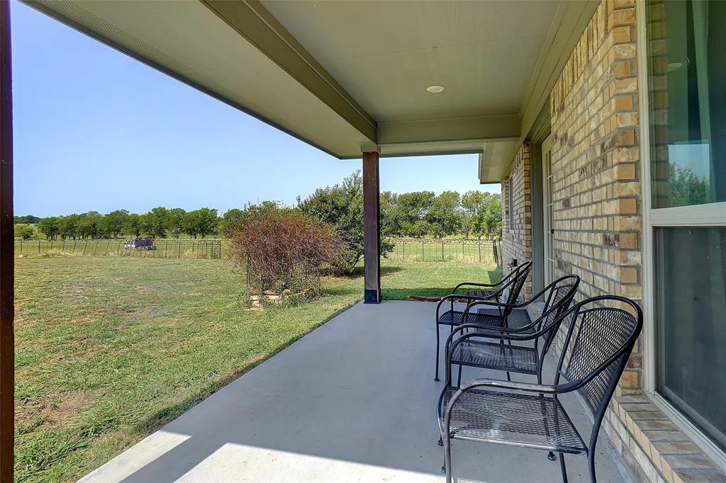 2376 Farm To Market Road 2264 Decatur, TX 76234 - Photo 6 of 39 a view of a patio with chairs and table in patio