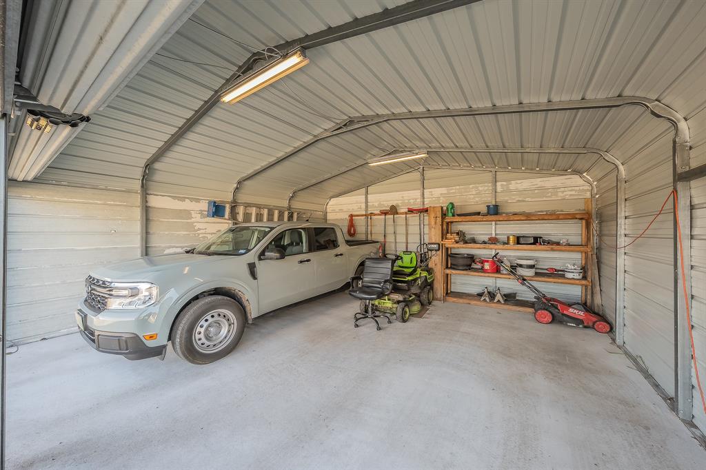 2376 Farm To Market Road 2264 Decatur, TX 76234 - Photo 8 of 39 a view of a garage and car parked