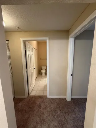 a view of empty room with windows