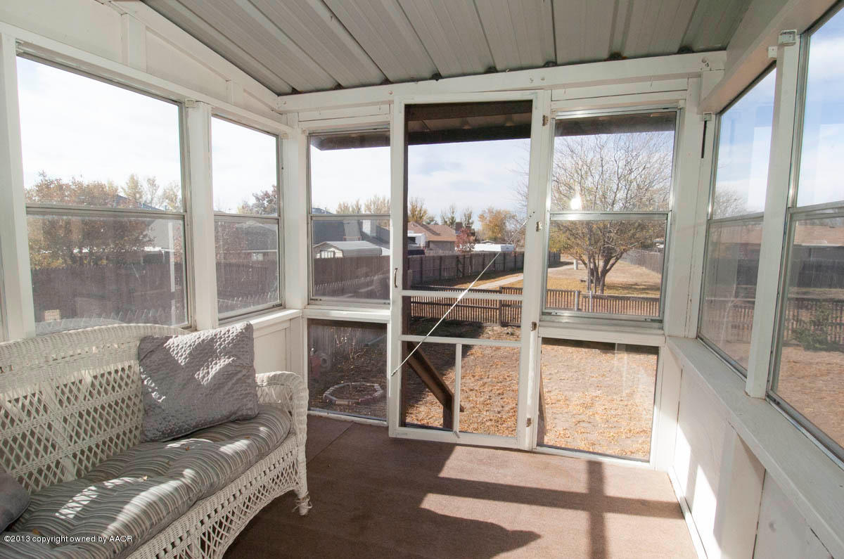 2903 Shield Court Amarillo, TX 79110 - Photo 24 of 29 a living room with furniture and a large window