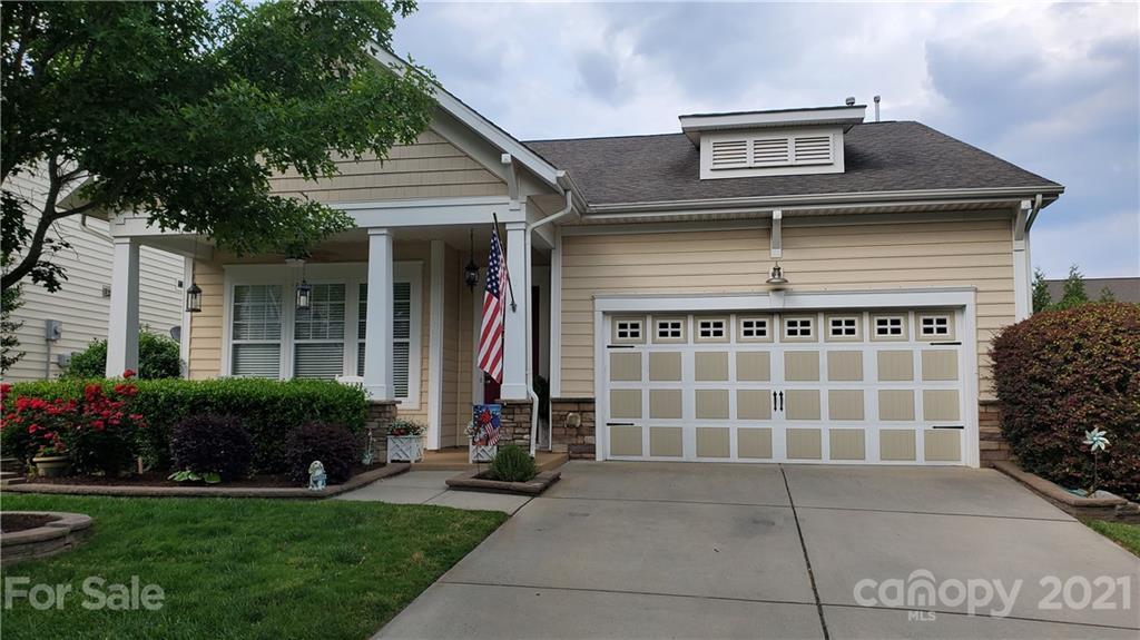 86578 Arrington Road Lancaster, SC 29720 - Photo 1 of 3 a front view of a house with garden