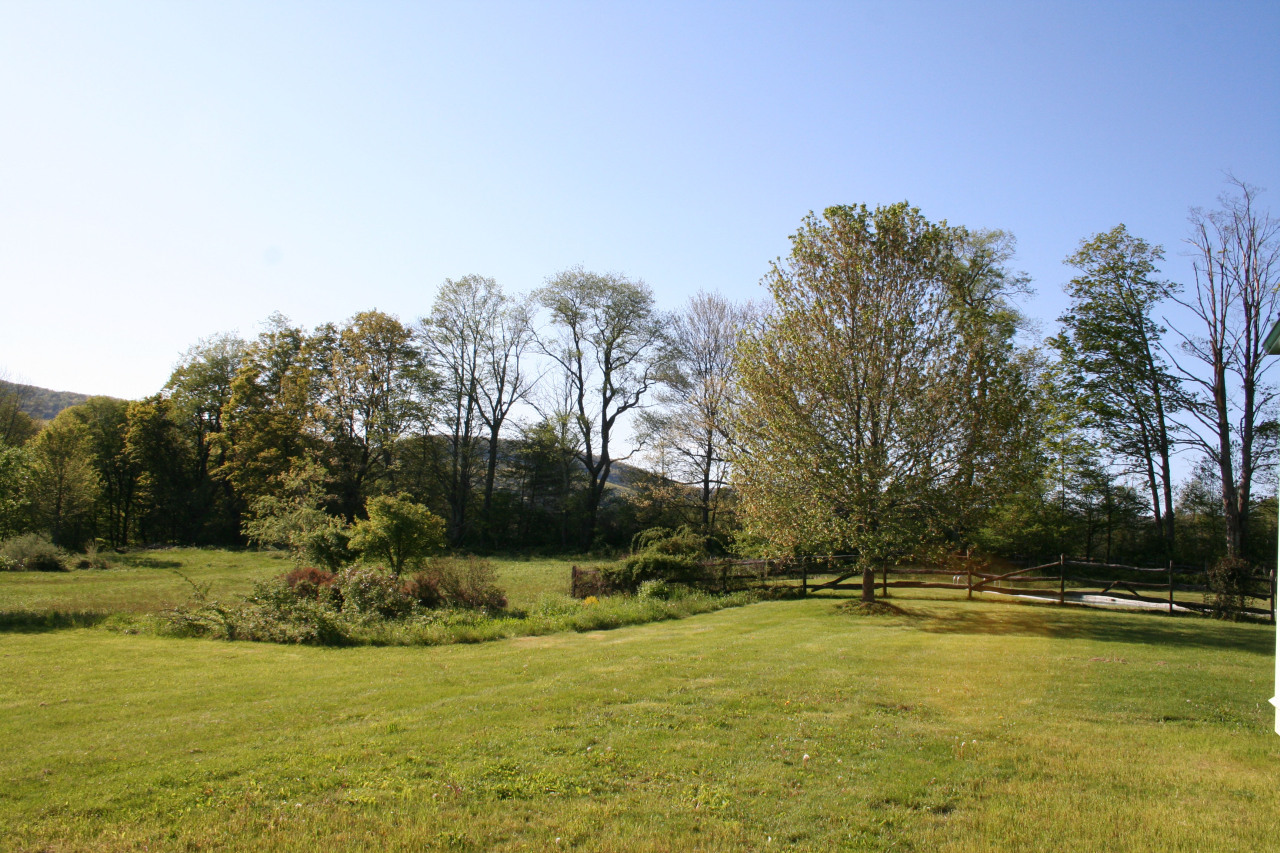 151 E Road Alford, MA 01266 - Photo 26 of 37 a view of a swimming pool with an outdoor space and seating area