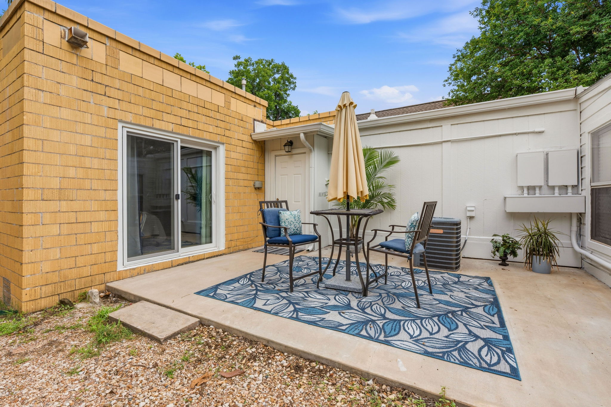 4611 Rosedale Avenue Austin, TX 78756 - Photo 20 of 35 The shaded patio off the back creates a comfortable outdoor room that extends the livable experience.