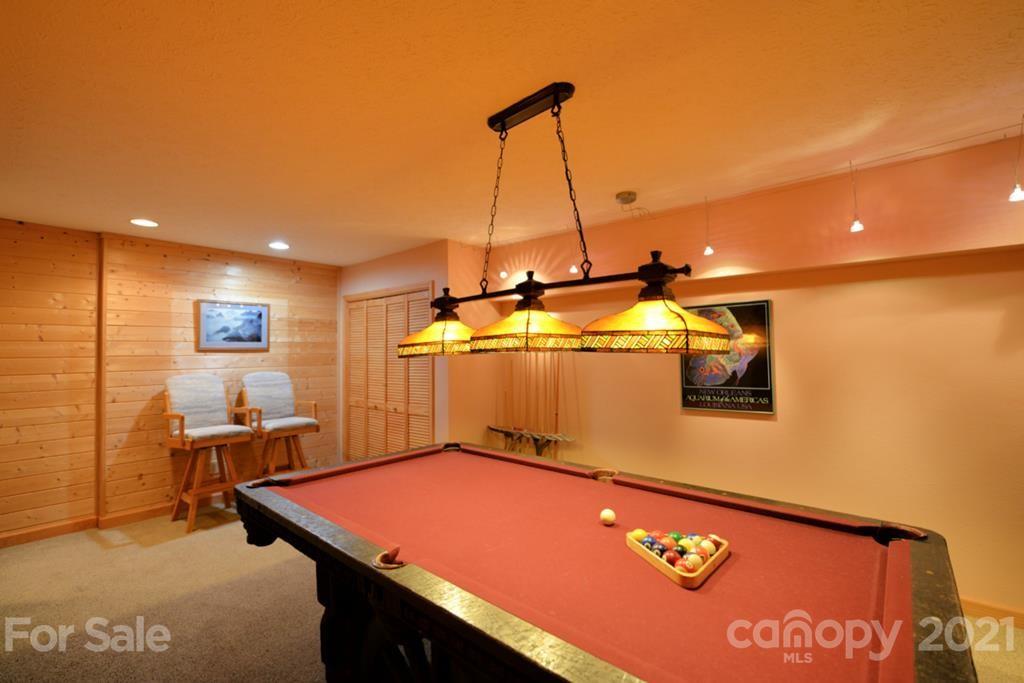 175 Owl Lookout Sylva, NC 28779 - Photo 17 of 20 a room with table tennis and air hockey table