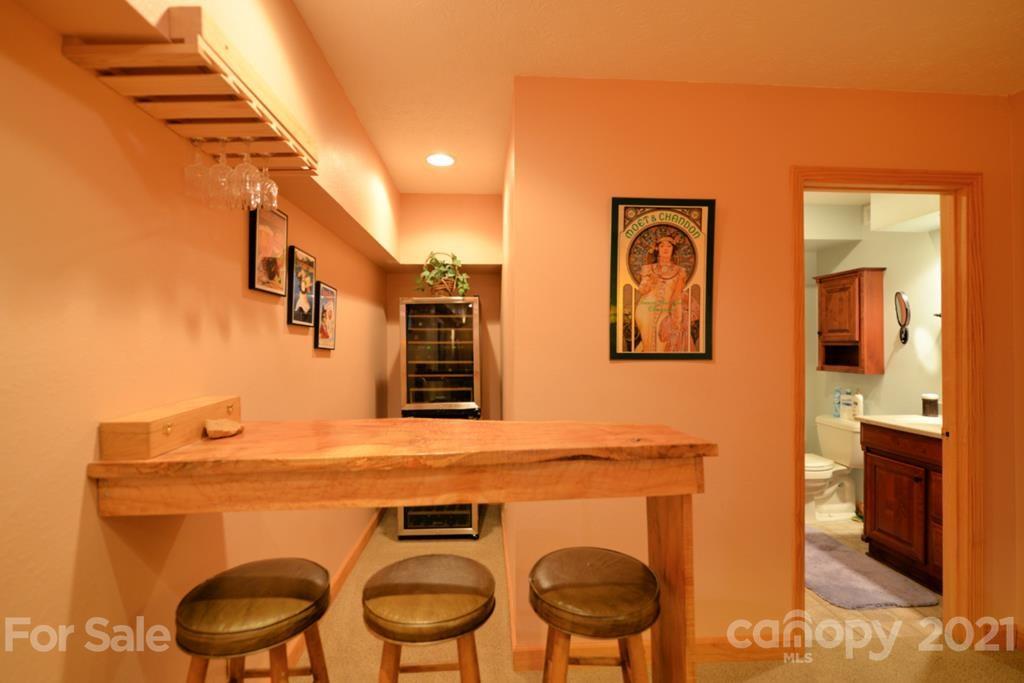 175 Owl Lookout Sylva, NC 28779 - Photo 18 of 20 a view of a livingroom with furniture and window