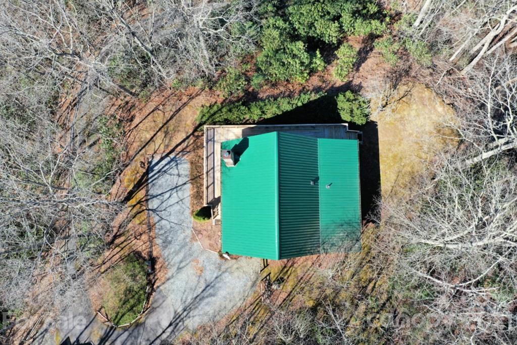 175 Owl Lookout Sylva, NC 28779 - Photo 5 of 20 a green field with trees in front of it