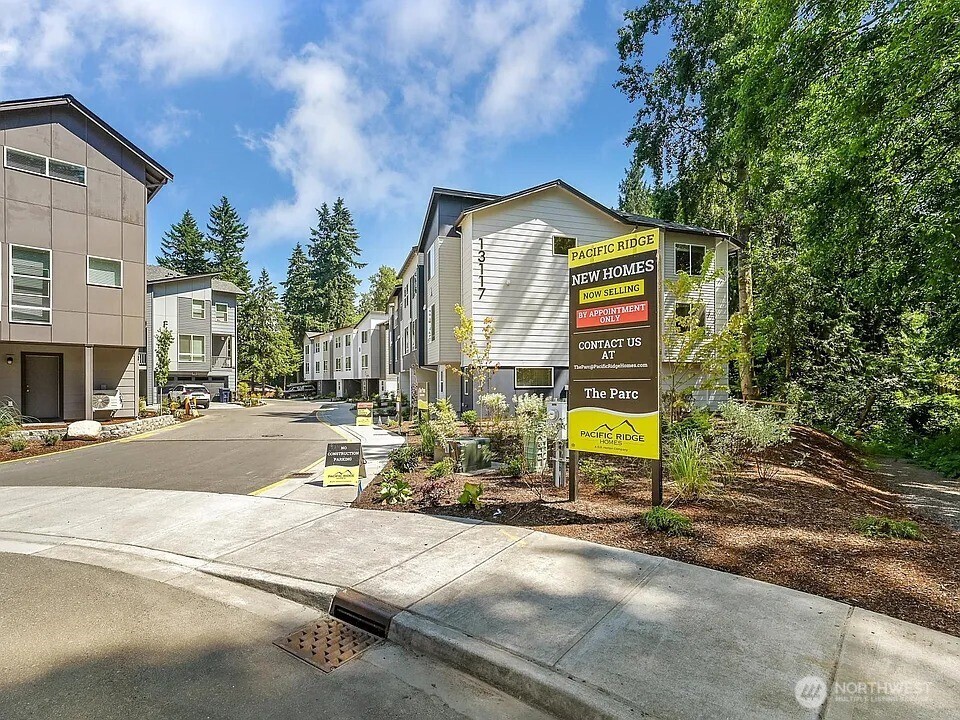 13117 3rd Avenue Southeast, Unit D5 Everett, WA 98208 - Photo 1 of 22 a view of a street with houses
