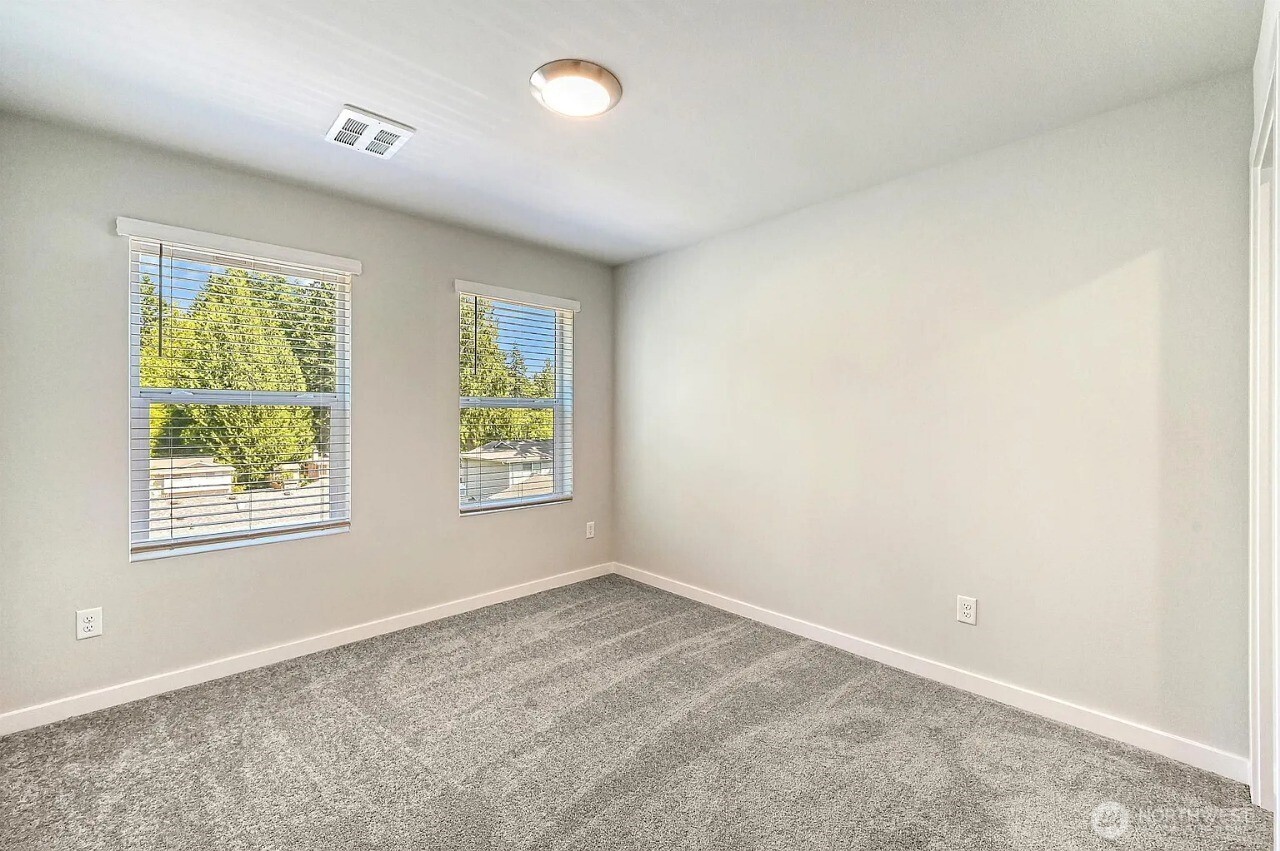 13117 3rd Avenue Southeast, Unit D5 Everett, WA 98208 - Photo 19 of 22 an empty room with windows