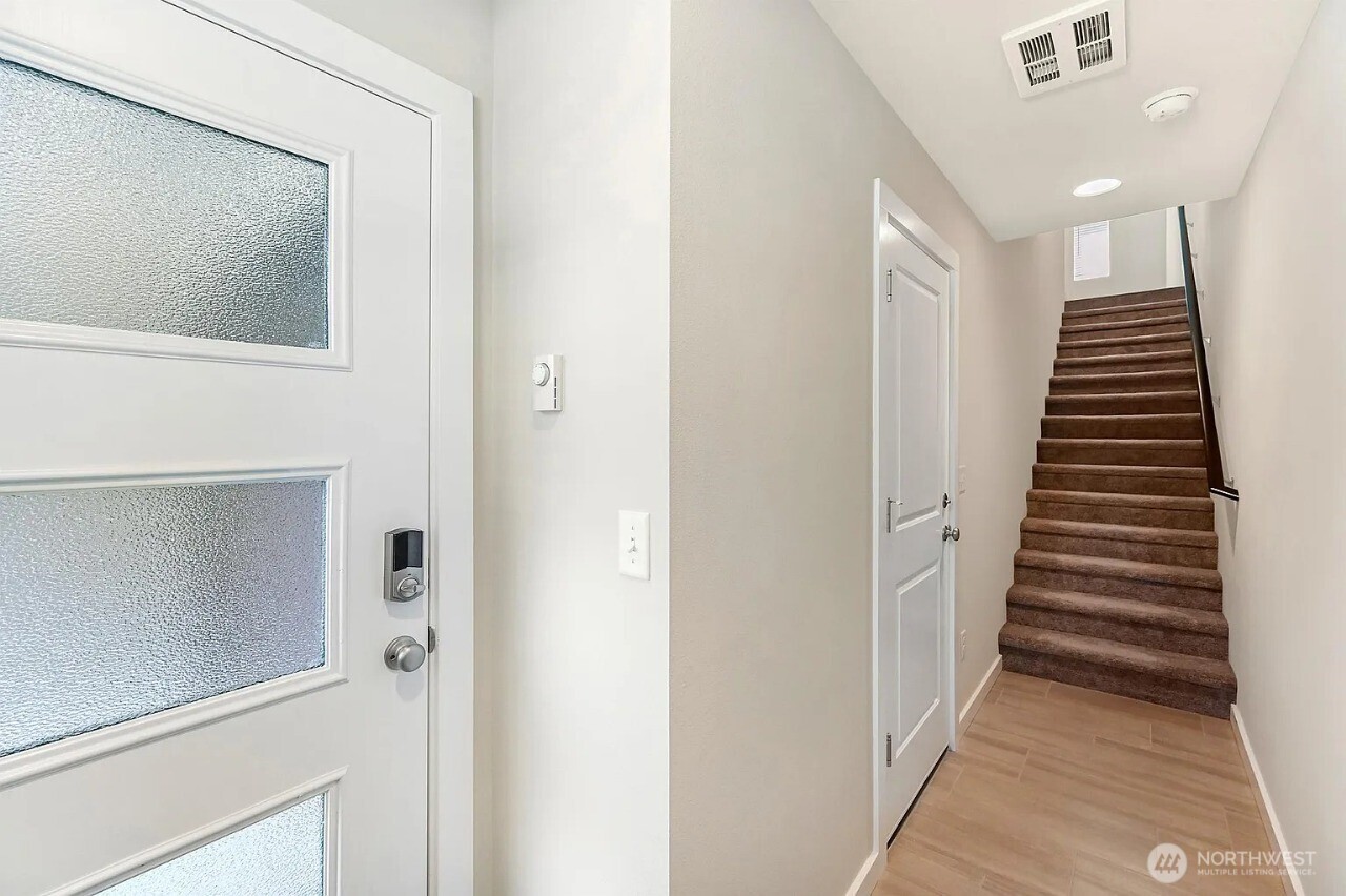 13117 3rd Avenue Southeast, Unit D5 Everett, WA 98208 - Photo 7 of 22 a view of a hallway with entryway