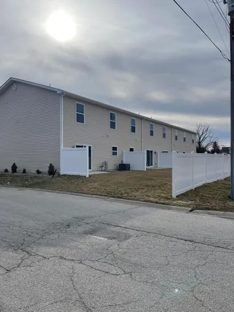 a view of a livingroom with natural light