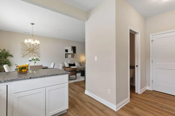 a view of a kitchen from a room