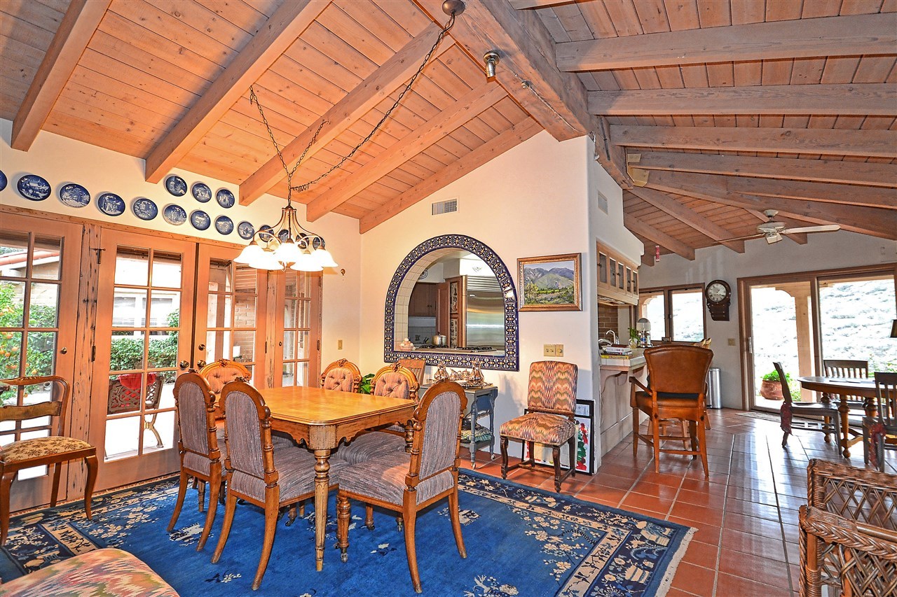 36880 Magee Road Pala, CA 92059 - Photo 14 of 25 DINING ROOM. COURTYARD ON THE LEFT, KITCHEN BEYOND.