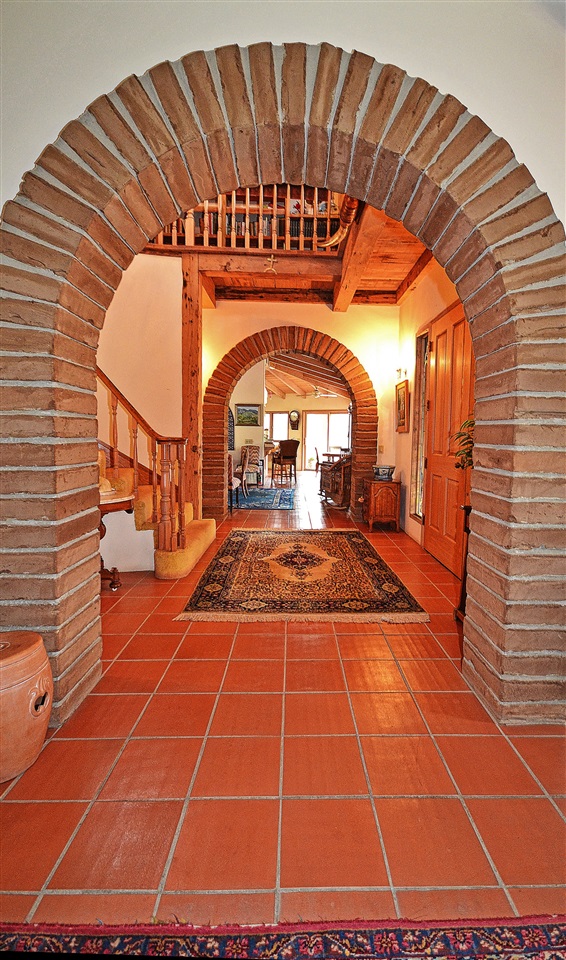 36880 Magee Road Pala, CA 92059 - Photo 4 of 25 ENTRY. STANDING IN THE GREAT ROOM. FRONT DOOR ON THE RIGHT, DINING AND KITCHEN BEYOND AND UP THE STAIRS IS THE BONUS ROOM.