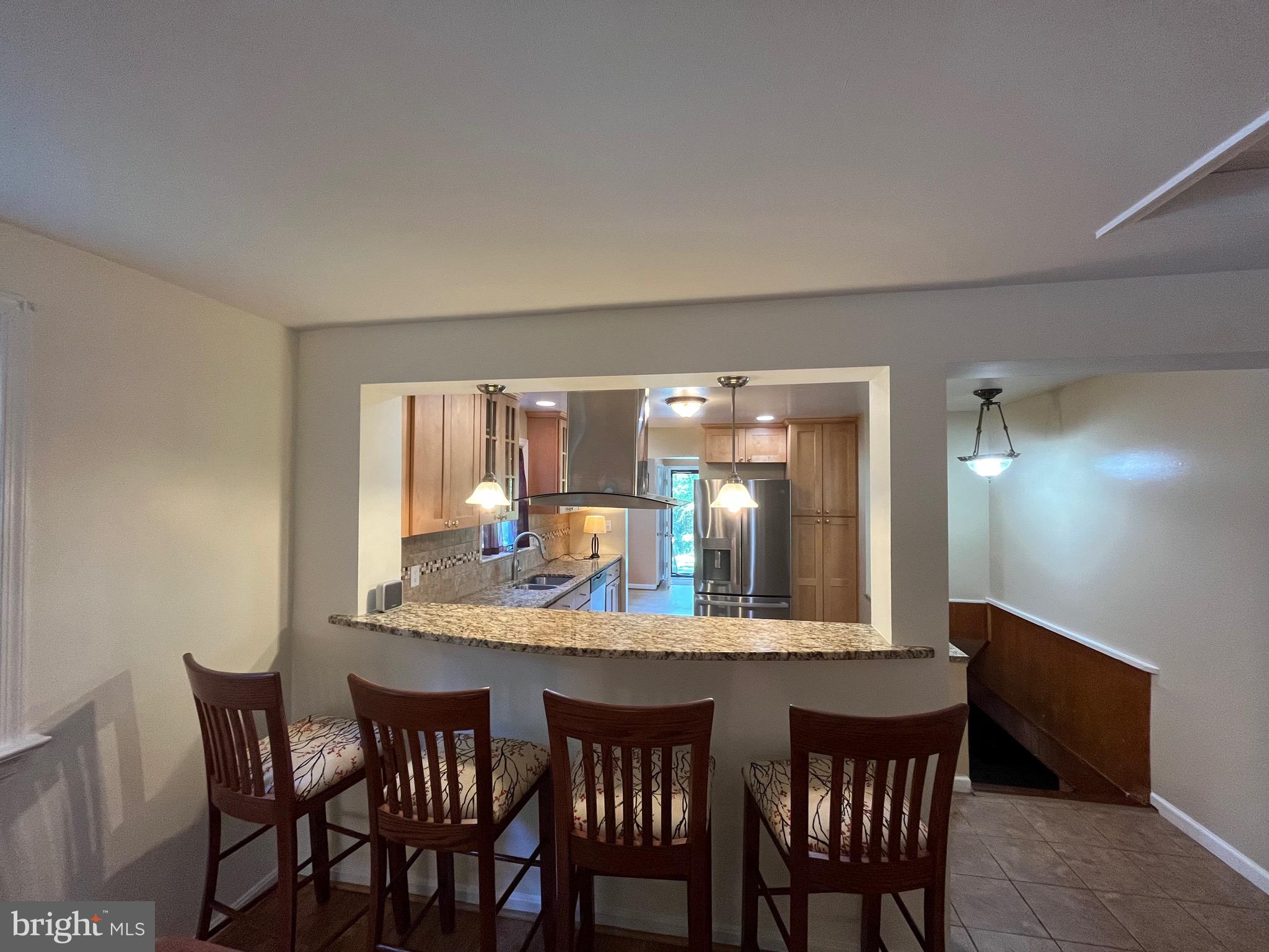 11836 Huggins Drive Silver Spring, MD 20902 - Photo 29 of 52 Family Rm Overlooks Kitchen