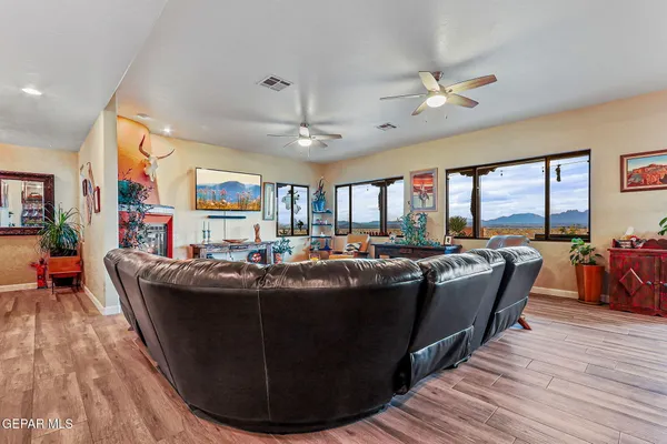 a kitchen with stainless steel appliances granite countertop a refrigerator and a stove
