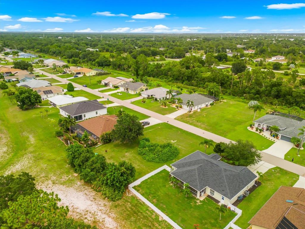 2381 Mauritania Road Punta Gorda, FL 33983 - Photo 9 of 12 an aerial view of residential houses with outdoor space and trees