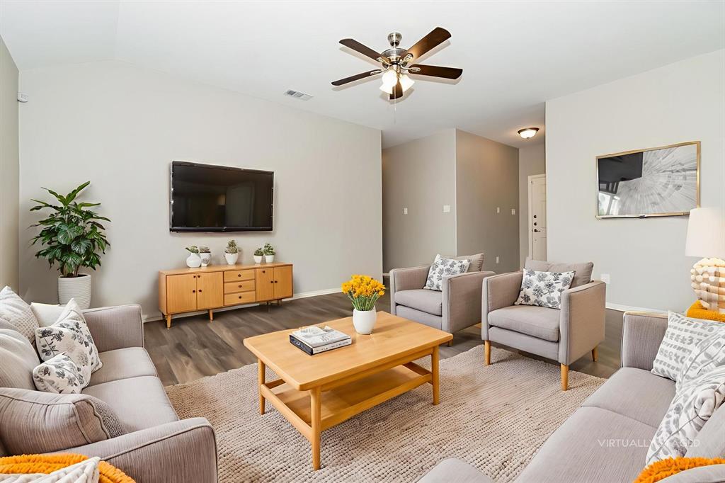 1821 Ridgecrest Drive Terrell, TX 75160 - Photo 5 of 18 a living room with furniture and a flat screen tv