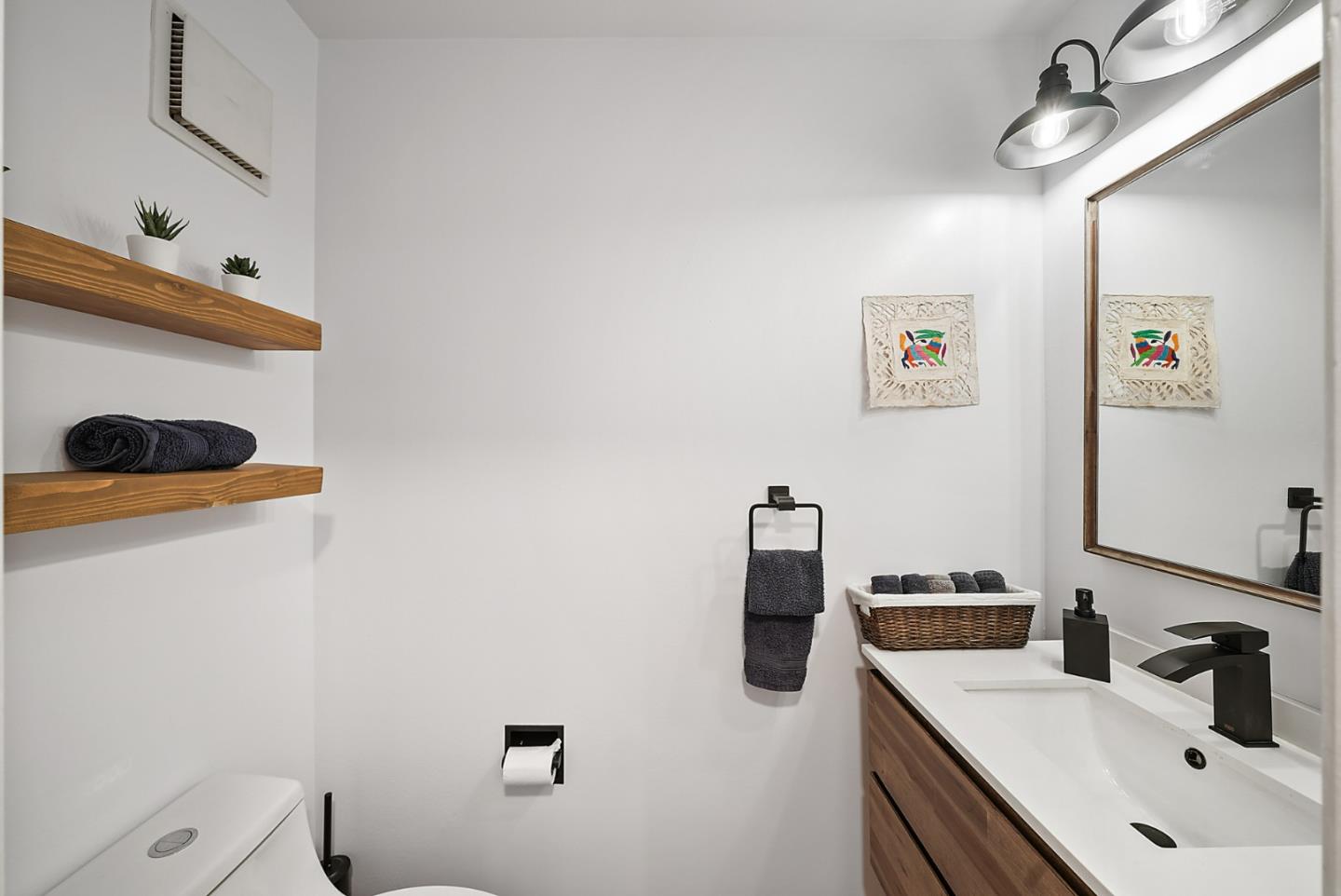 252 Bay Vista Circle Sausalito, CA 94965 - Photo 13 of 35 a bathroom with a sink and a mirror