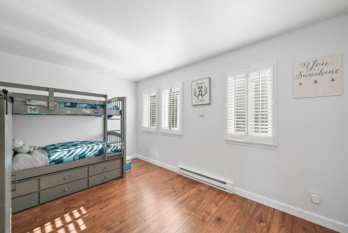 252 Bay Vista Circle Sausalito, CA 94965 - Photo 15 of 35 a view of room with wooden floor and fan