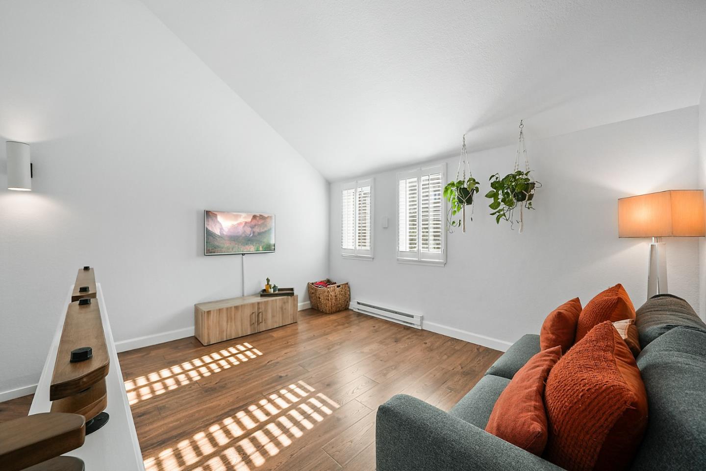 252 Bay Vista Circle Sausalito, CA 94965 - Photo 24 of 35 a living room with furniture and a lamp
