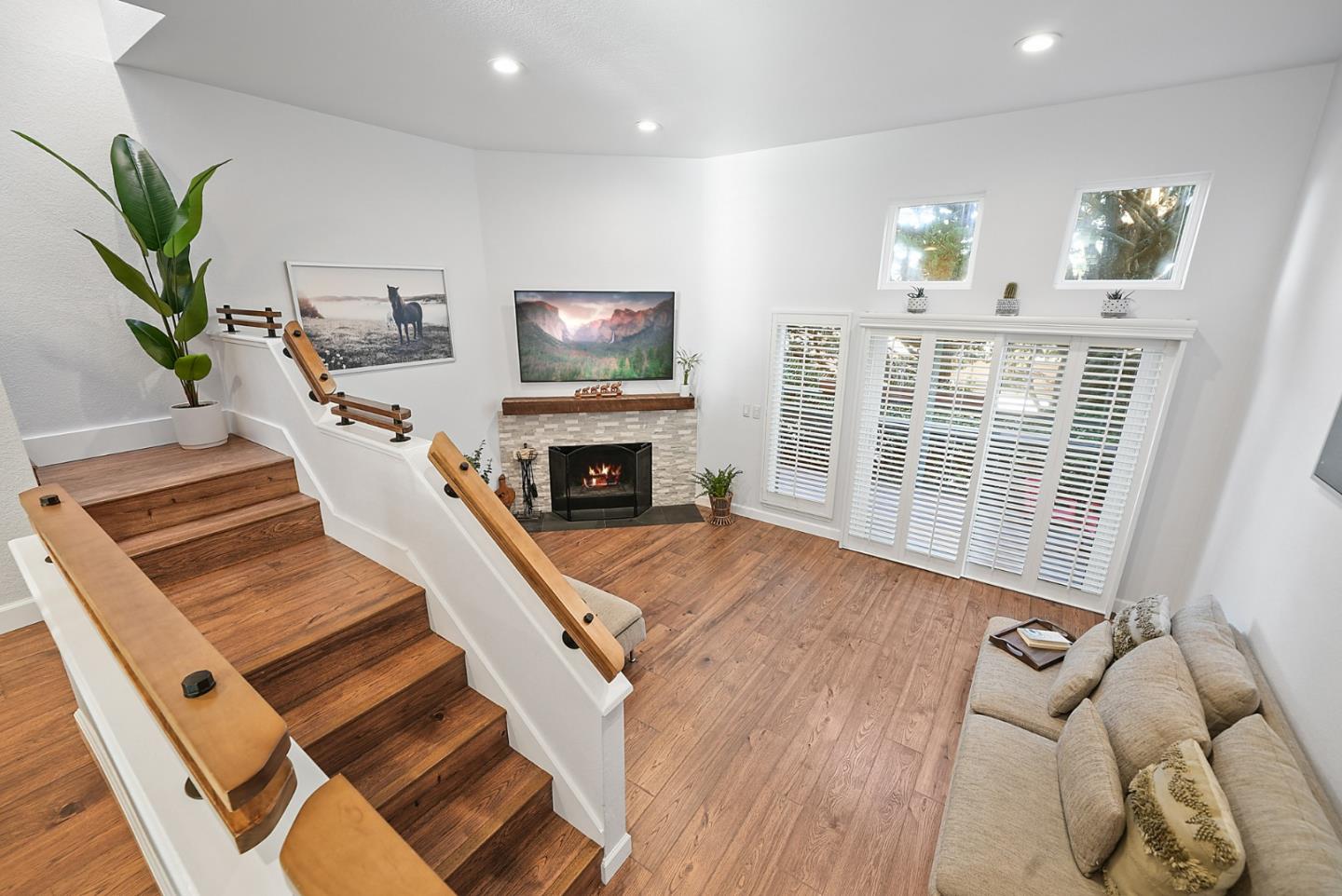 252 Bay Vista Circle Sausalito, CA 94965 - Photo 8 of 35 a living room with furniture and a flat screen tv
