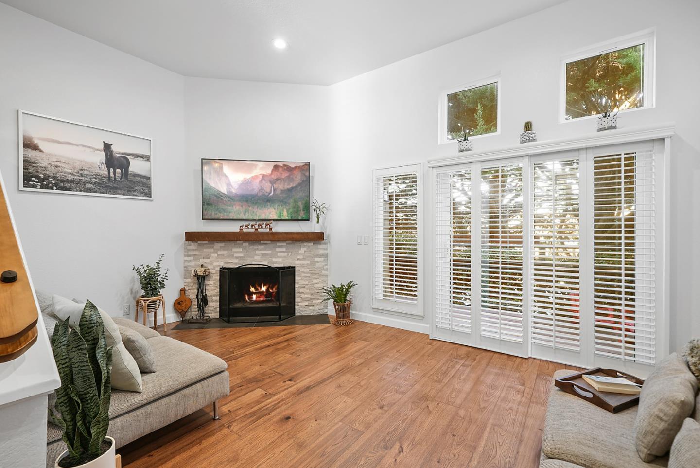 252 Bay Vista Circle Sausalito, CA 94965 - Photo 9 of 35 a living room with furniture a fireplace and a large window