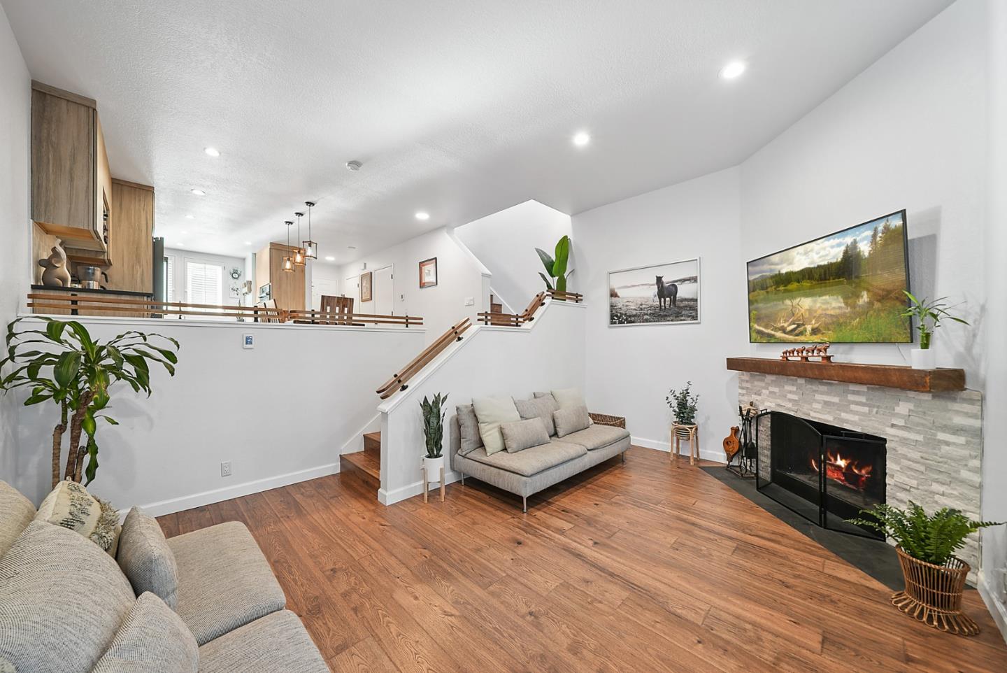 252 Bay Vista Circle Sausalito, CA 94965 - Photo 10 of 35 a living room with furniture and a fireplace
